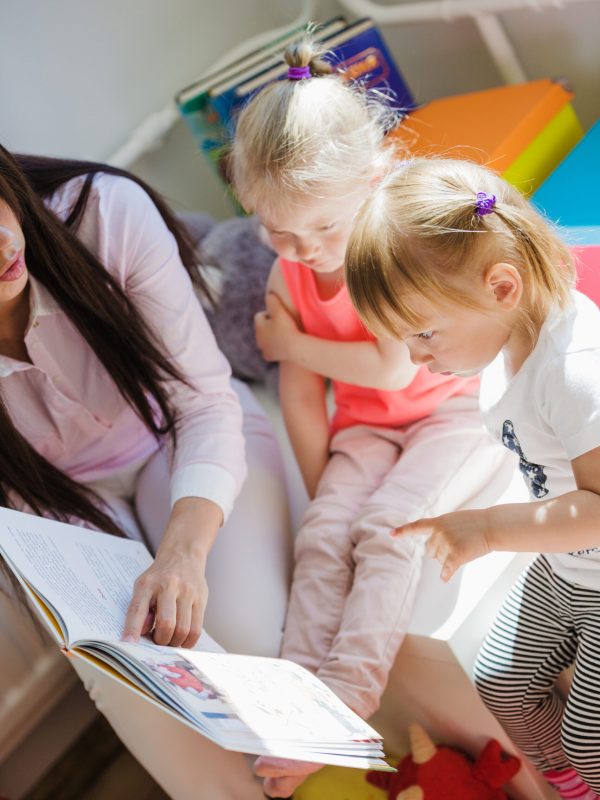 woman-reading-book-children